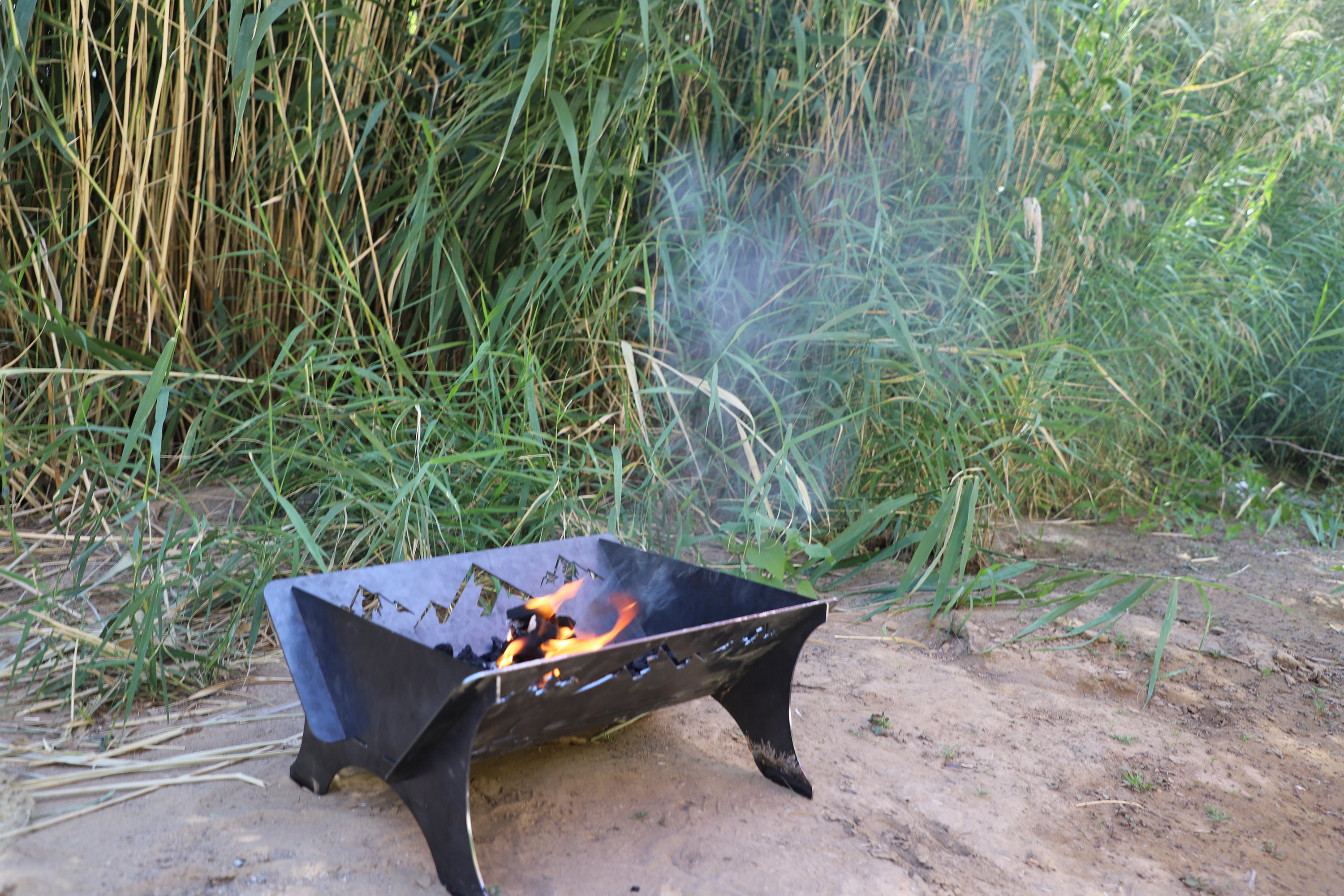 Flat pack fire pit and grill